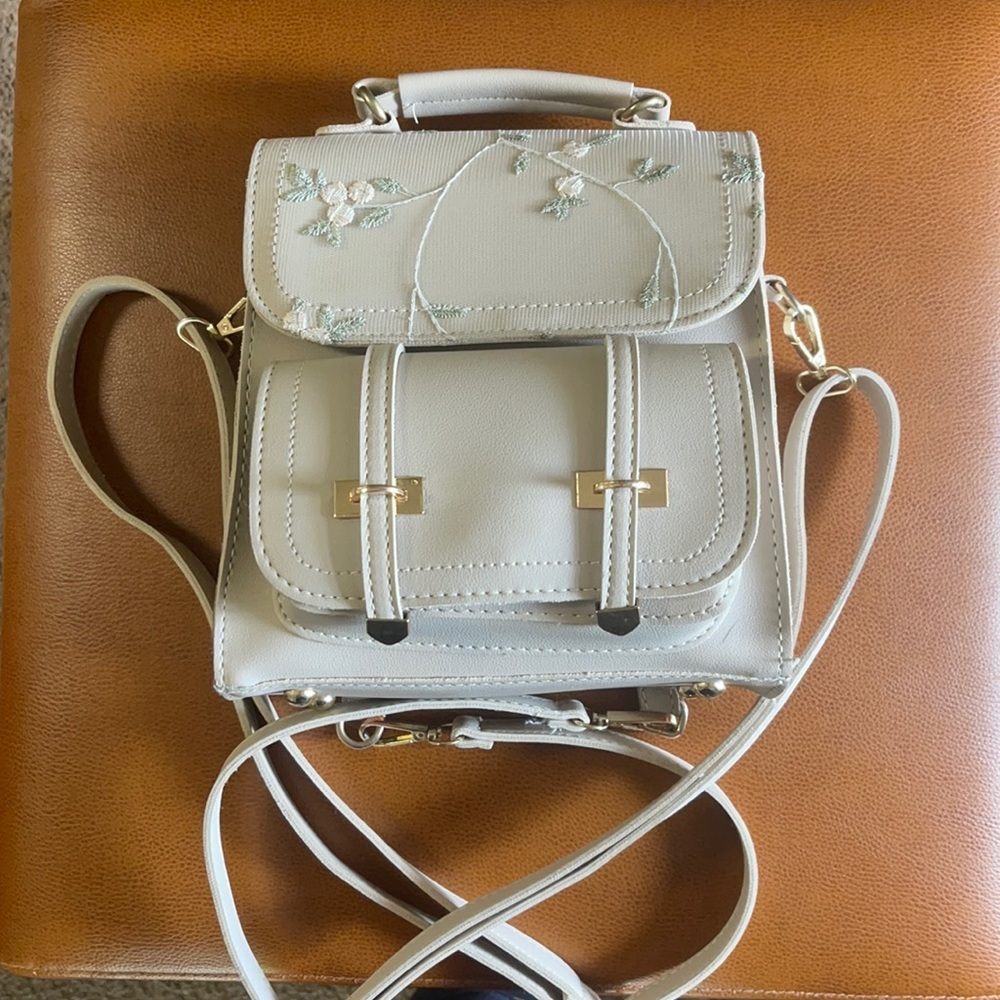 Embroired cream backpack purse